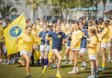 Photo of a students running. Links to Gifts by Will page.