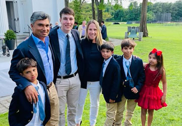 Rajesh and Emily Alva (P ’27, ’29, ’30) with their family